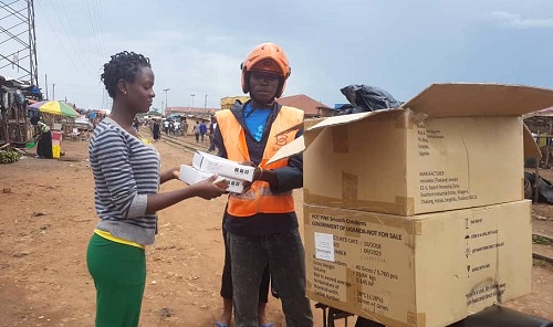 A SafeBoda driver delivers reproductive health commodities.