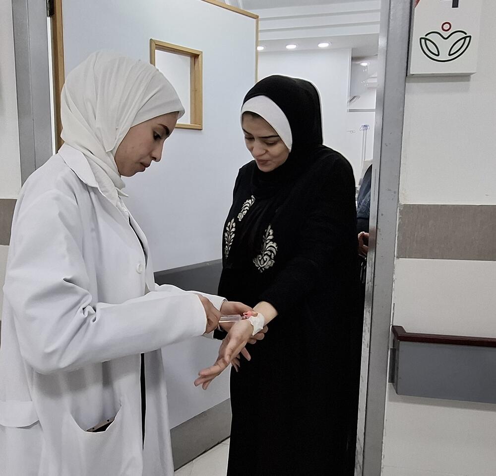 In Nuseirat, Roozan Abu Jbarah suffered a difficult pregnancy in the war on Gaza, with critical health facilities and supplies largely unavailable across the territory. © UNFPA/Yasmeen Sous