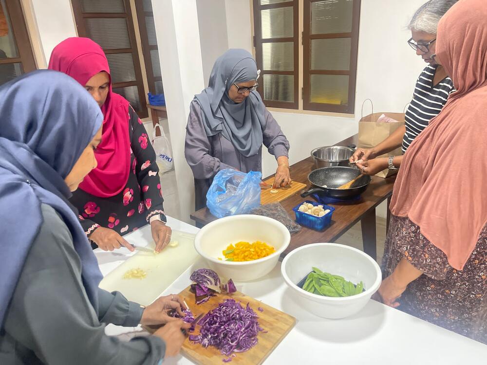 group of women preparing food