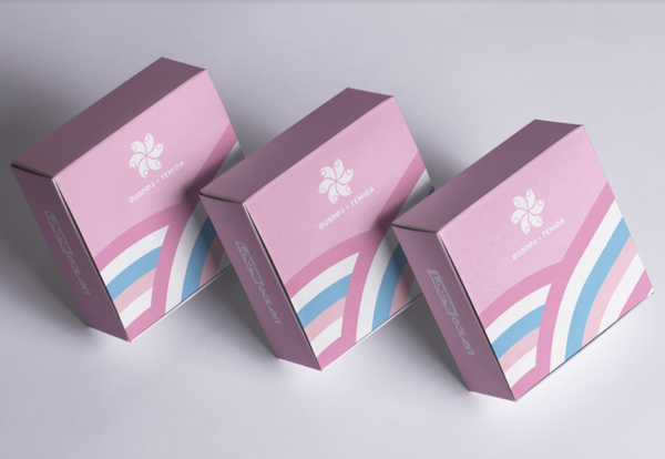 hree HIV prevention kits prepared by TEMIDA - pink boxes with pink, white and blue stripes across the bottom.