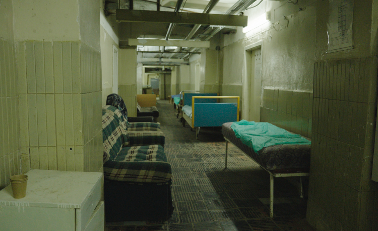 operating tables and couches in an underground bunker