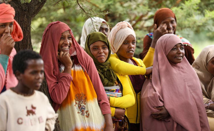 Group of young people laughing.