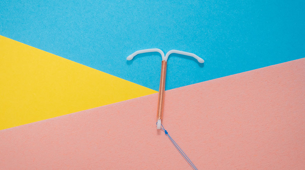 A photo shows a close up of an intrauterine device. 